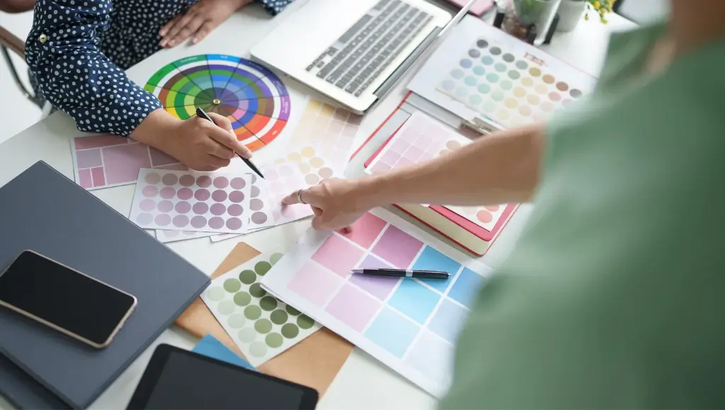 A picture of two people working working on a projects